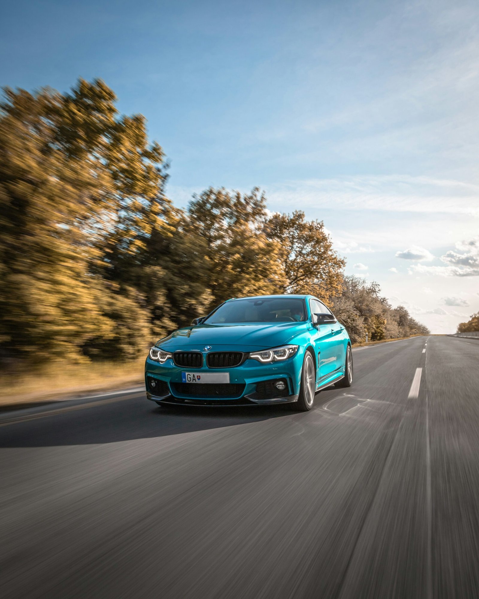 Modern car on an open road.